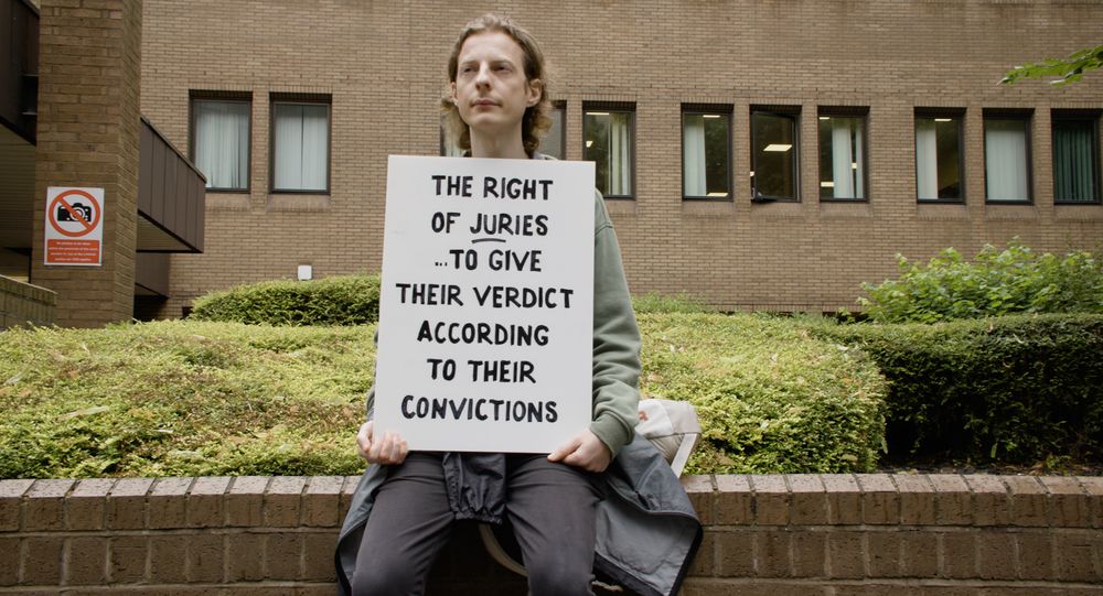 Defend Our Juries outside court