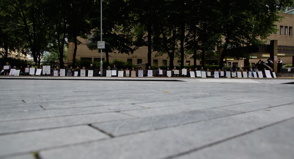 Defend Our Juries outside court