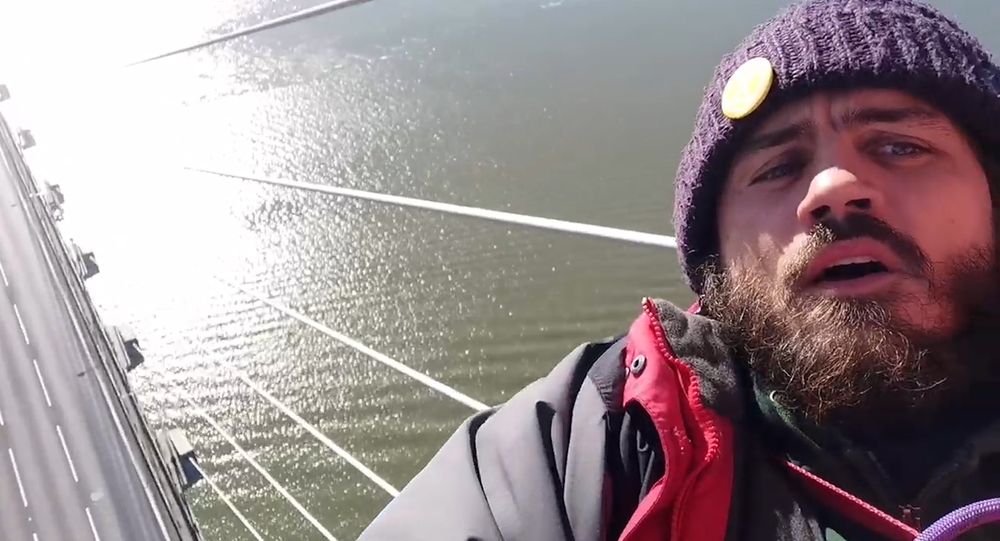 Marcus Decker in a hammock on the bridge